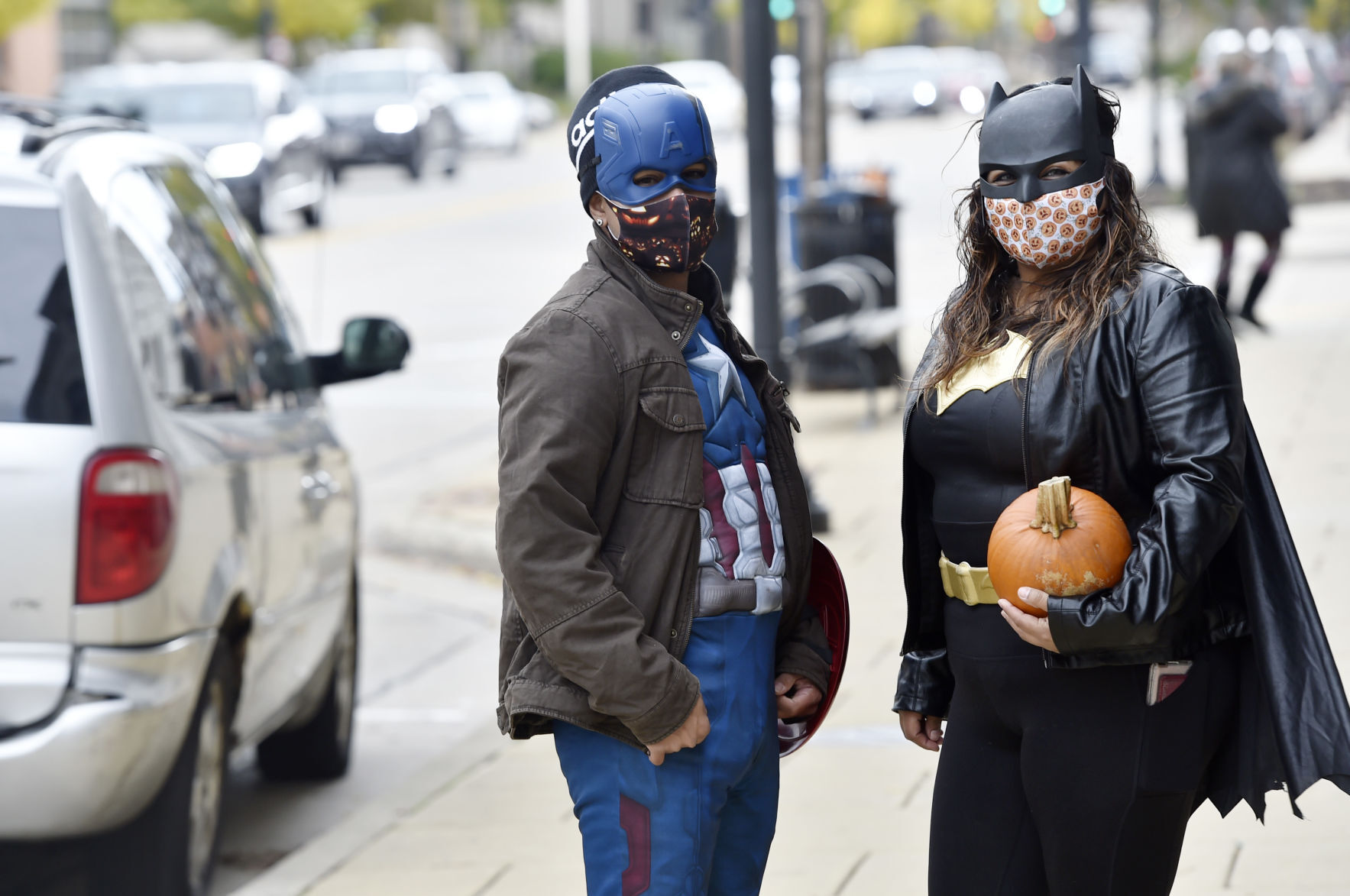 Captain America, Batgirl and a pumpkin